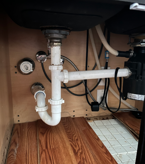 Pull and reset toilet and fix leaking drain under sink