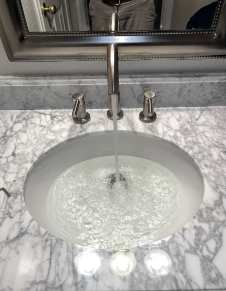 Install faucet and vanity drain work