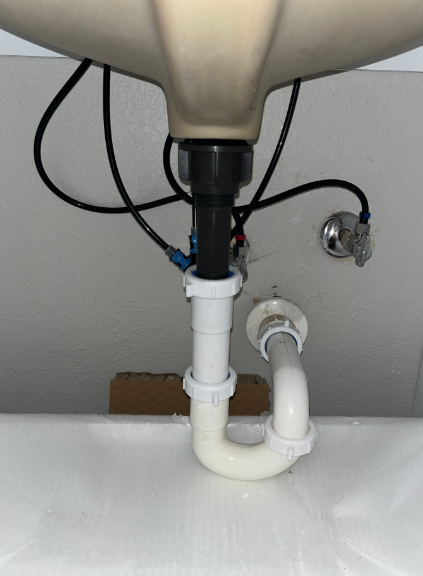Install faucet and vanity drain work