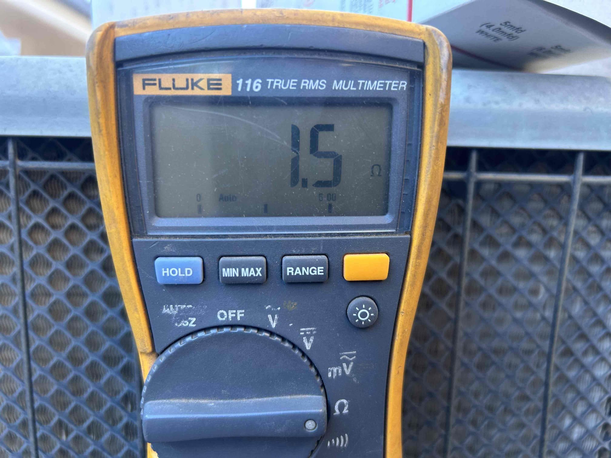 Arrived to home
Checked thermostat
Checked system
Found compressor windings damaged
Capacitor at 0/0 of 80/7.5
Contactor

Performed repairs
Inrush kit
Amrad capacitor
Contactor

Rechecked system
System operating at this time 

Replacement advisable due to age/deterioration of compressor