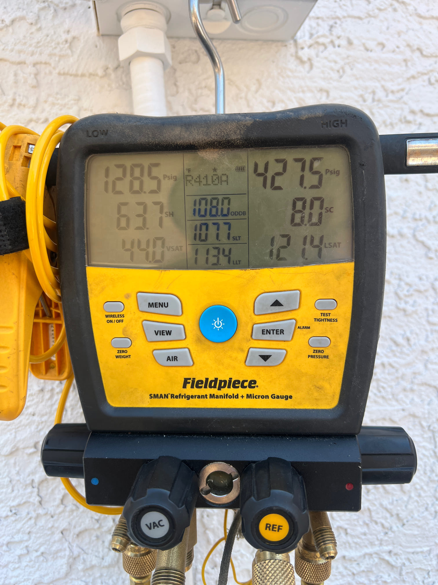 Performed a membership visit on the downstairs system. The homeowner was having an issue with the reversing valve releasing when the call for cooling ended. I programmed the thermostat to get it to stop doing that the units operating properly.