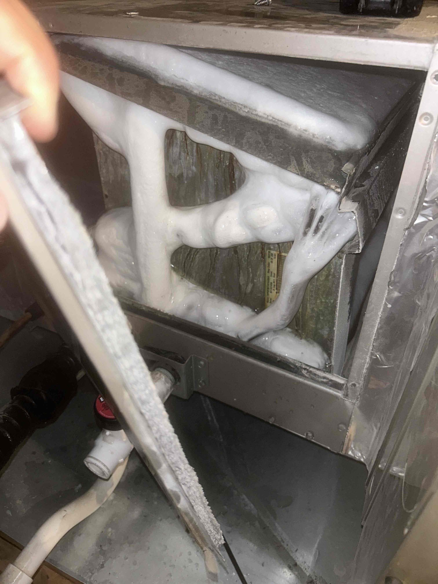 Downstairs unit was not cooling due to a tripped float switch safety device. The line was clogged. Approval was given to clear line out. Unit upstairs is also not cooling and was found with the compressor and evaporator coil frozen. Frozen coils can occur due to improper airflow or a refrigerant issue and can lead to expensive repairs.. System is from 2009, considering new system install replacement is adviced. Prior company was out a few weeks ago and there is a list of recommended repairs on this system. I have left the unit on fan on only to help thaw out the coil. System downstairs is cooling at departure. Install estimate has been scheduled for later this afternoon.