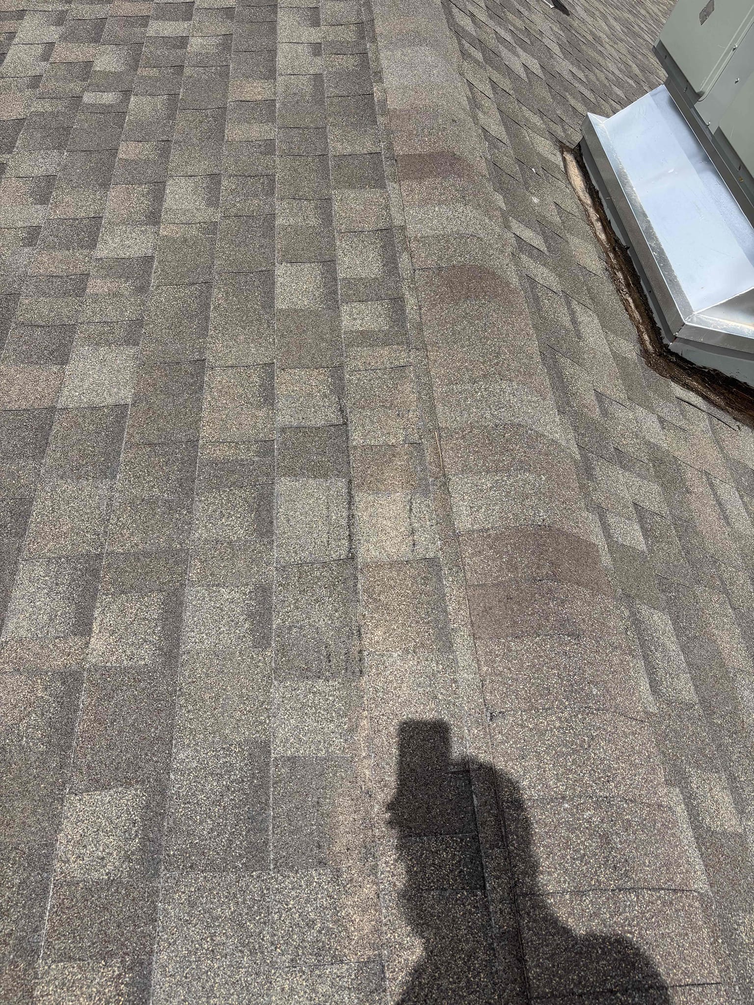 I inspected our equipment and verified good seal around unit. I found shingles near equipment to be damaged closer to location of interior leak 