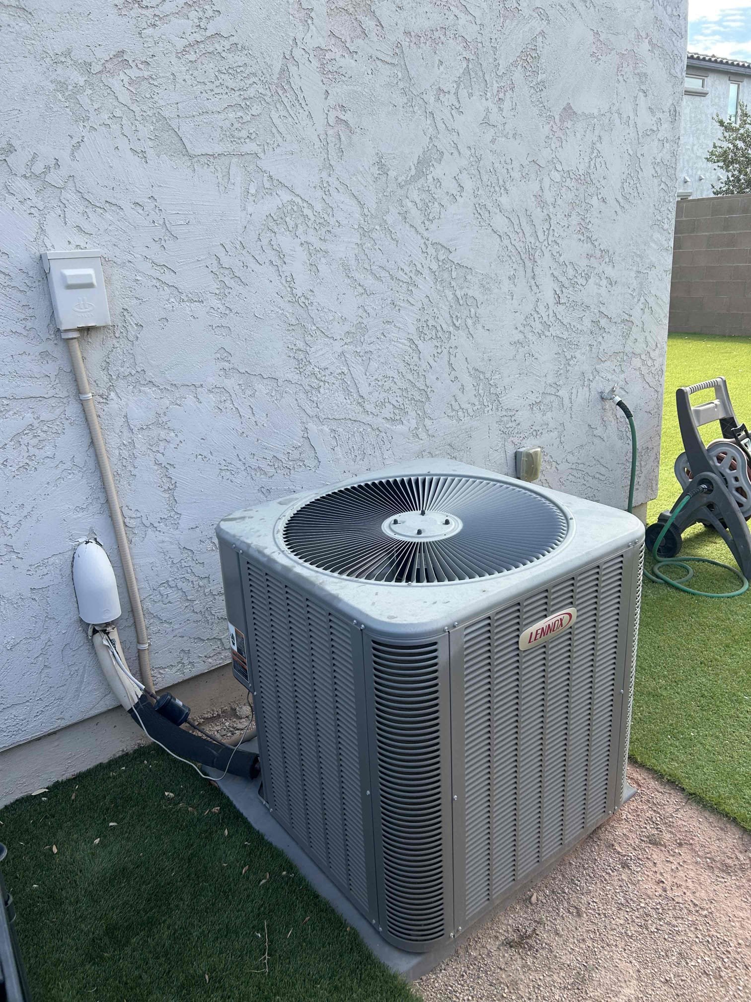 Free second opinion. Unit is low on charge, leak is found at evap coil. Though the unit is 5 years old I have also advised to look at unit replacement. The current unit is a single stage equipment with 2 zone. This set up is not the best for the equipment and will decrease the life expectancy. The unit is still cooling at its best capacity at time of departure. 