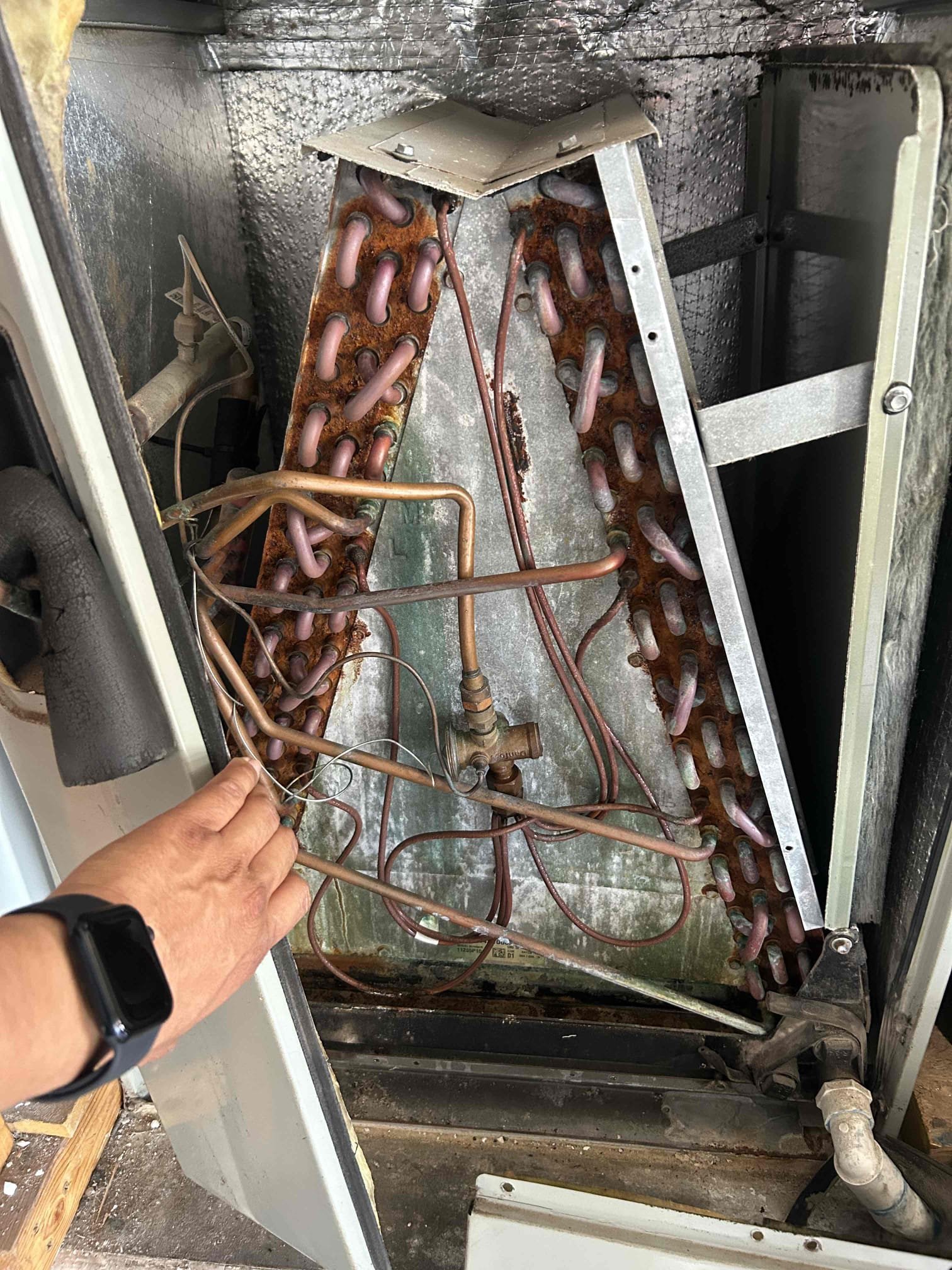 Inspection Findings:
During the service visit, the air conditioning system was found to be low on refrigerant charge. Upon inspecting the evaporator coil, traces of refrigerant oil were observed, which is a strong indicator of a potential refrigerant leak at or near the evaporator coil. If the customer wishes to proceed, a comprehensive leak detection test (using dye, electronic detector, or pressure test methods) can be performed to verify the source 100%.
Due to the unknown duration the system has been operating while low on refrigerant, it is not possible to determine whether the compressor has sustained internal damage at this time.
Professional Recommendation:
Considering the age of the equipment, the low refrigerant condition, the suspected coil leak, and the potential risk to the compressor, it is recommended to replace the entire A/C system to ensure reliable and efficient operation going forward.