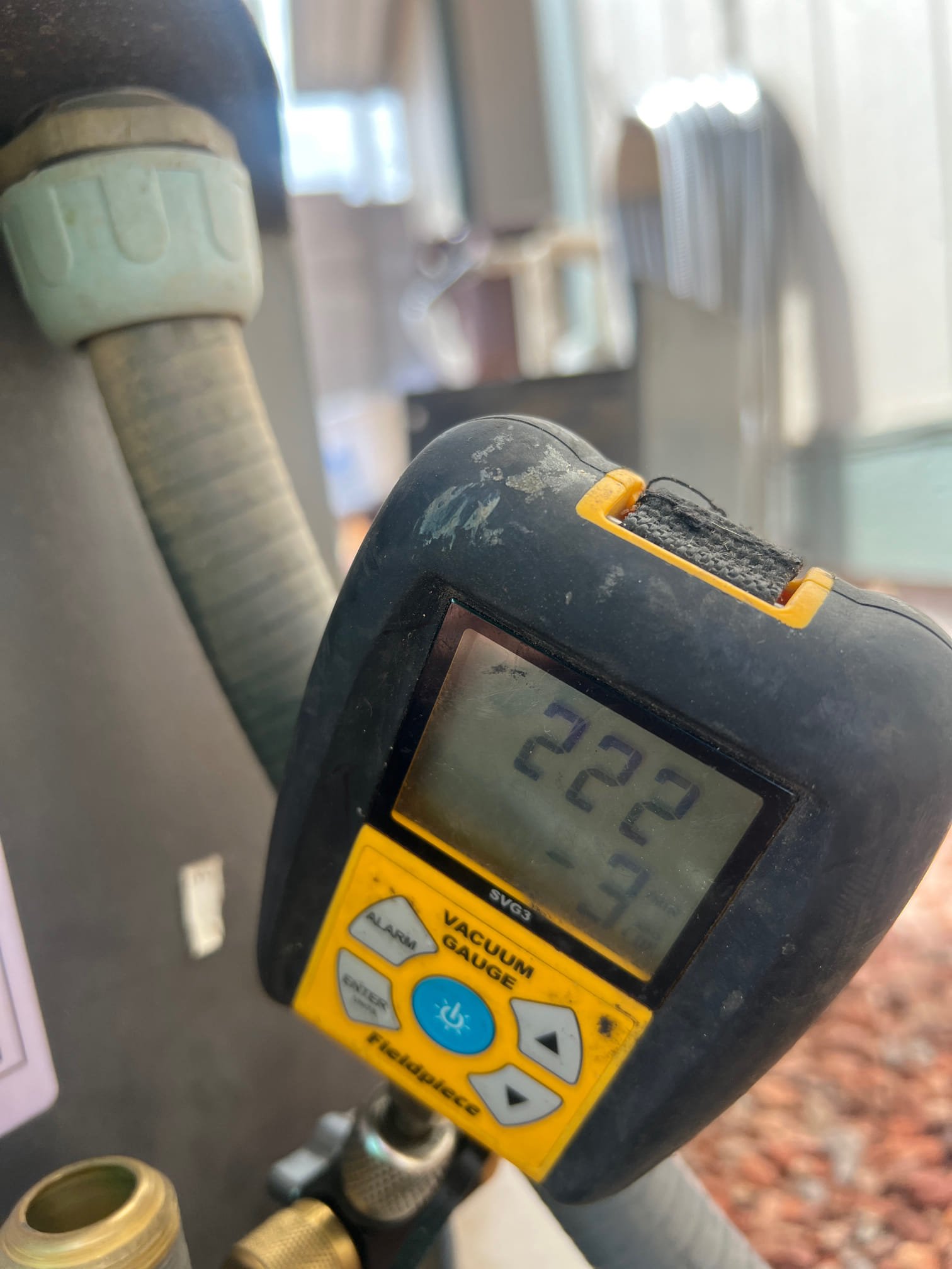 I returned and replaced the indoor coil and adjusted the Freon charge to factory specifications. The unit is operating properly at this time.