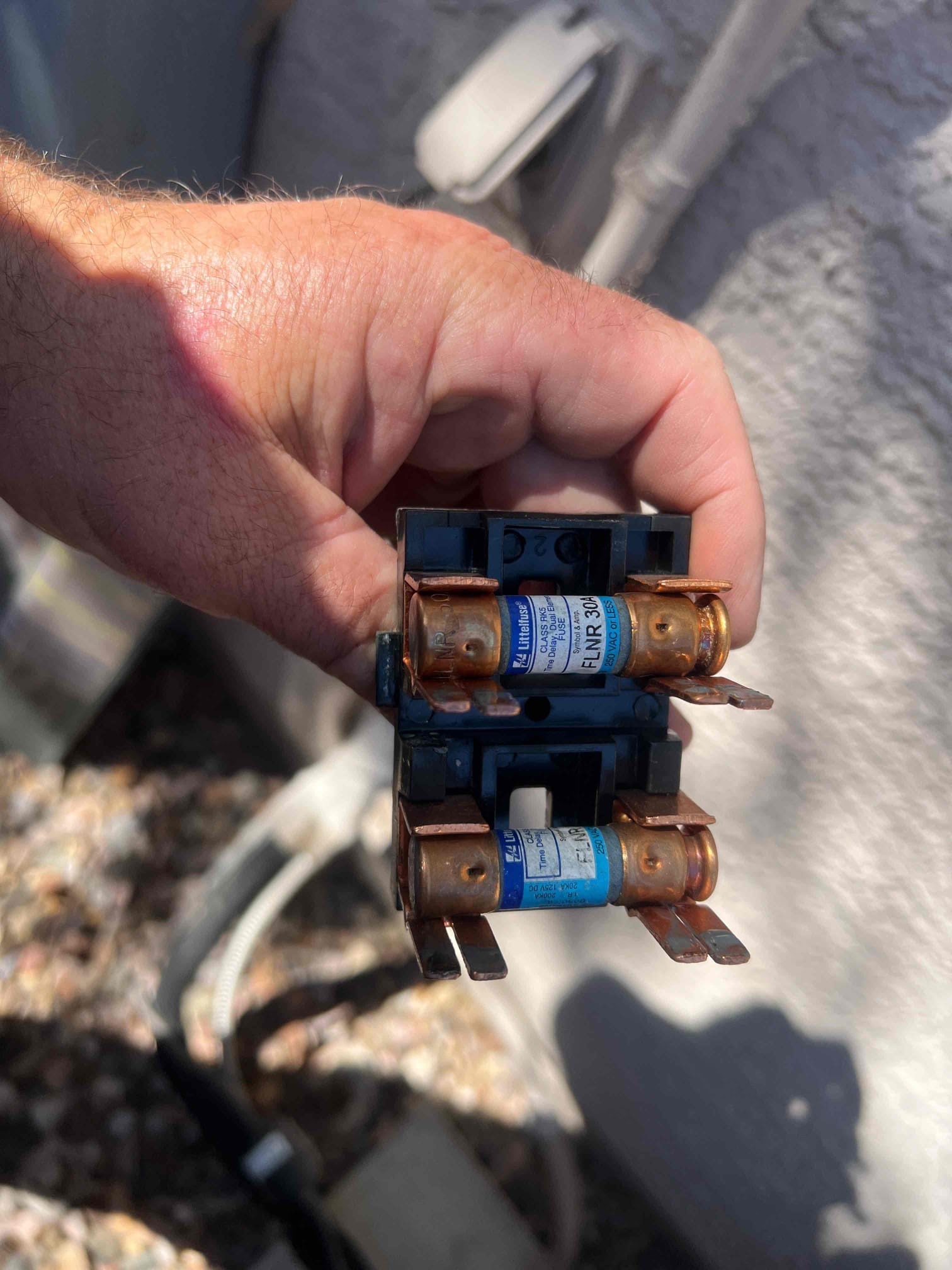 The unit had a blown fuse in the disconnect. I checked over the system for any electrical issues. The capacitor tested good and I did not find any shorted wires or loose connections. I replaced the fuse and checked operations and the unit is running within specifications.