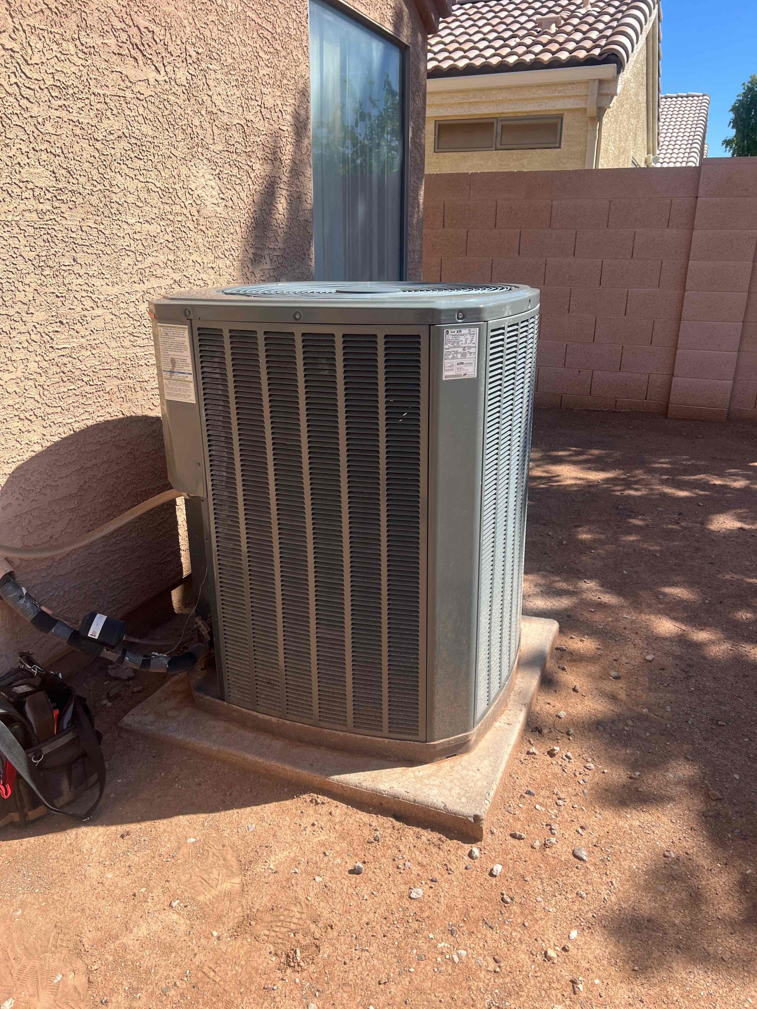The homeowner experienced turning the system on, and it would click to run and then going to waiting mode for equipment. I checked over the system and all the low-voltage wiring. The contactor coil is starting to fail. Taking an om reading and pushing in the contactor, I found it would go from, 16 ohms down to in some cases .05 ohms losing resistance. This will cause a drop in voltage at the transformer resetting the thermostat. I replaced the contactor. The air handler has water in the secondary pan and the insulation inside the cabinet is wet. the supply Plenum is tapped straight off the end and this will cause higher velocity airflow through the coil making the condensate pan into the cabinet. I gave the homeowner a rough estimate for a replacing the supply Plenum. The unit unit is operating properly at this time for conditions 