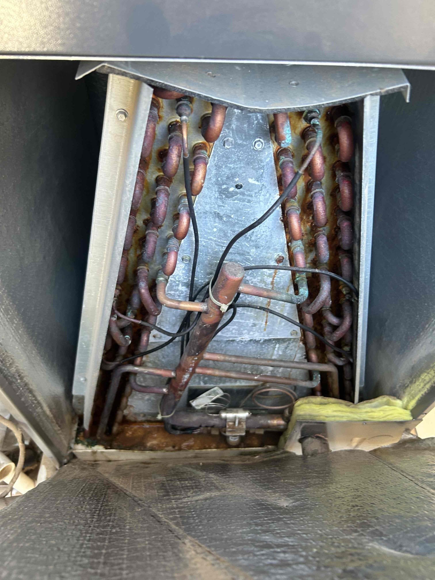 South unit had a failed float switch which lead to water leaking at the air handler. On the north side unit I adjusted the threshold temperature setting at the thermostat as it was off by 5 degrees. 