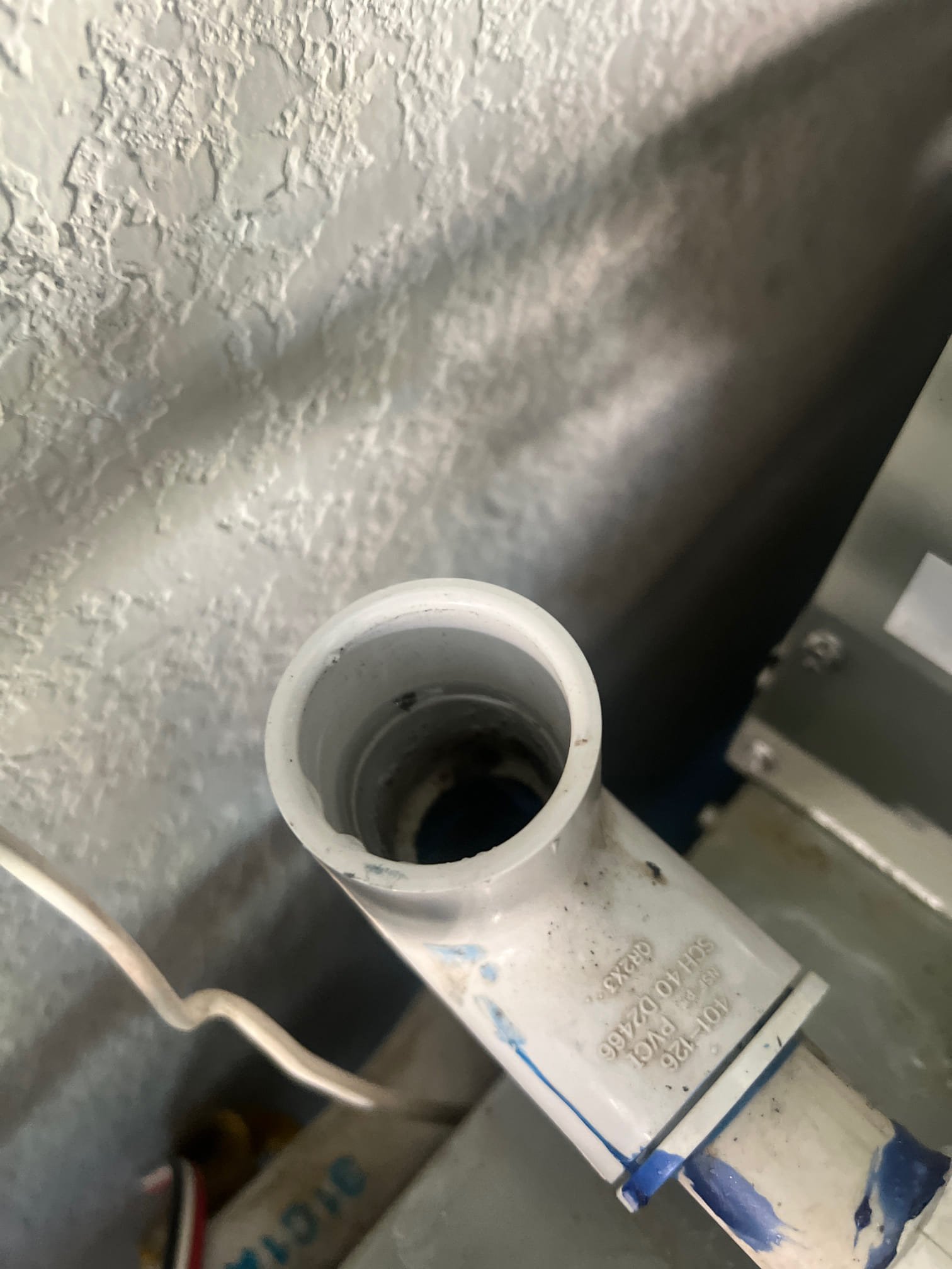 The units condensate line has become clogged. I cleared the condensate and verified that it’s flowing properly.