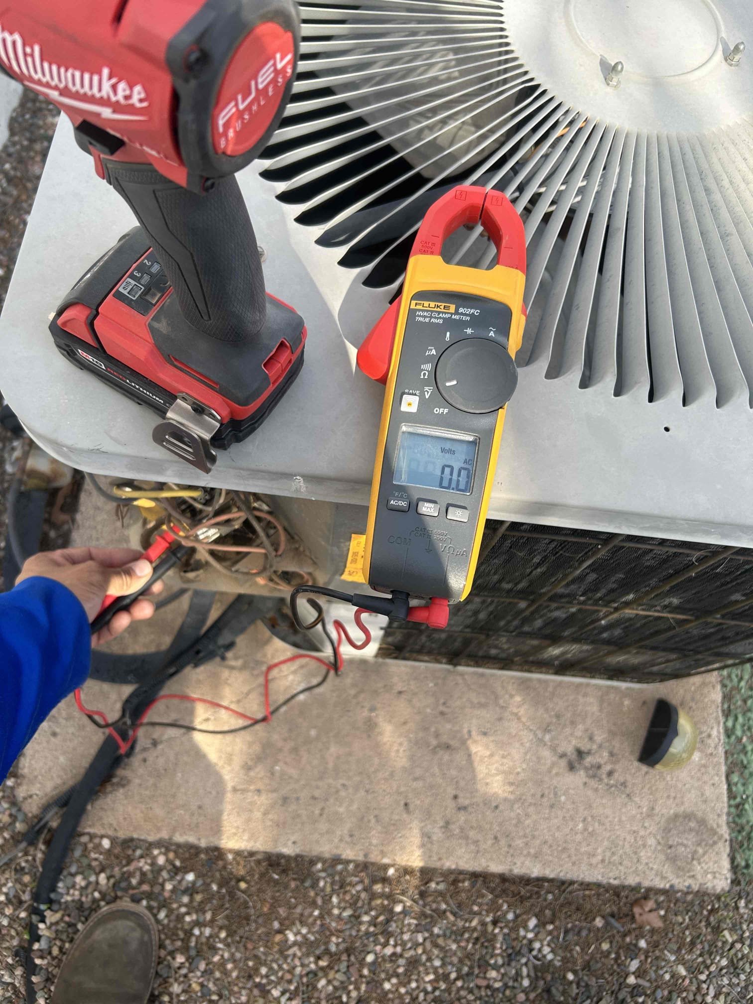 Condenser is not receiving high voltage. I have recommended to contact an electrician. 