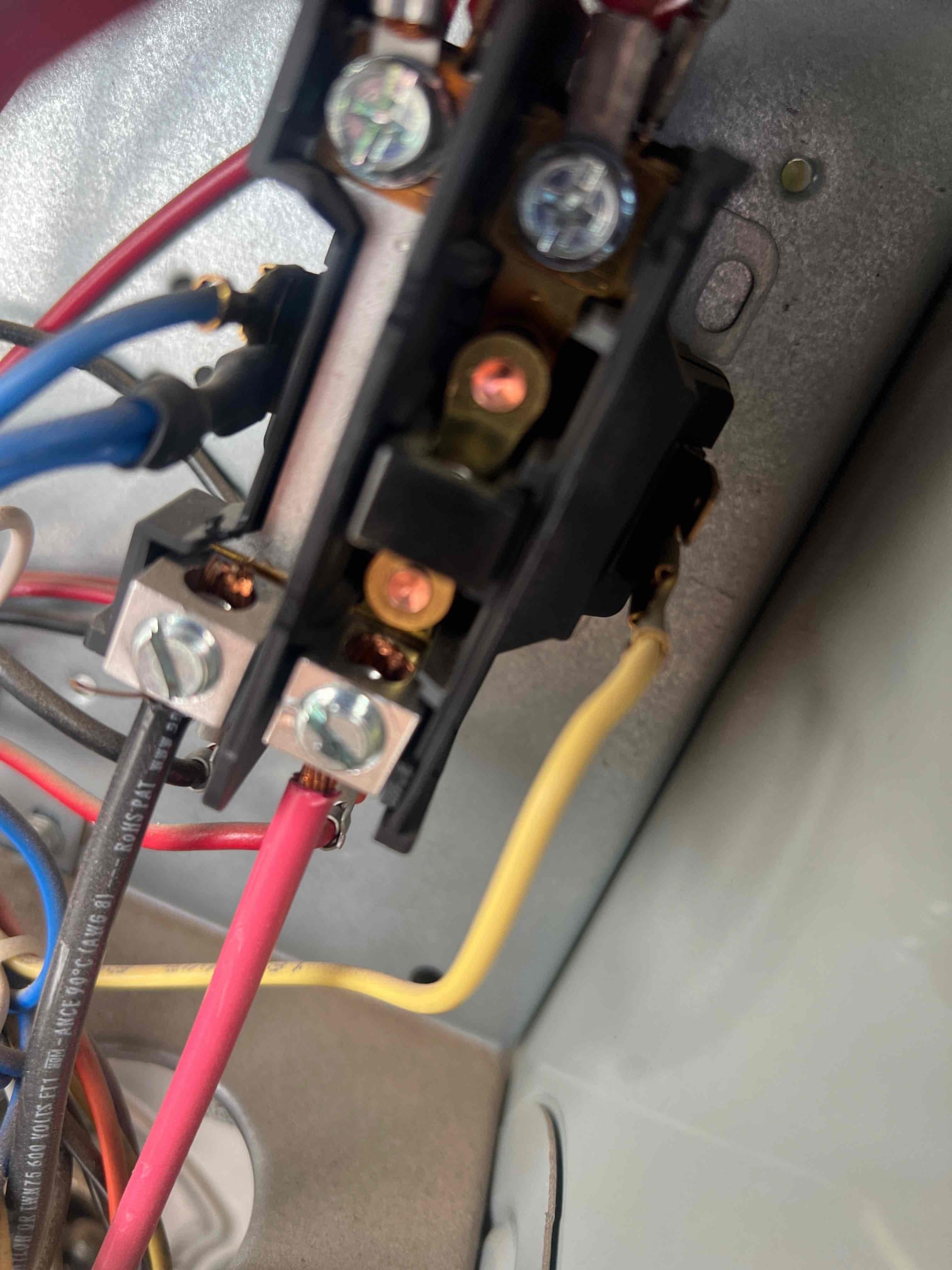 The breaker was tripped for the unit. I checked over the system and did not find any shorts and the capacitors tested good. I started the system and found it was suffering from excessively high starting amperage. I installed an inrush kit to Control starting amperage and prolong the life of the system. The units operating properly at this time.