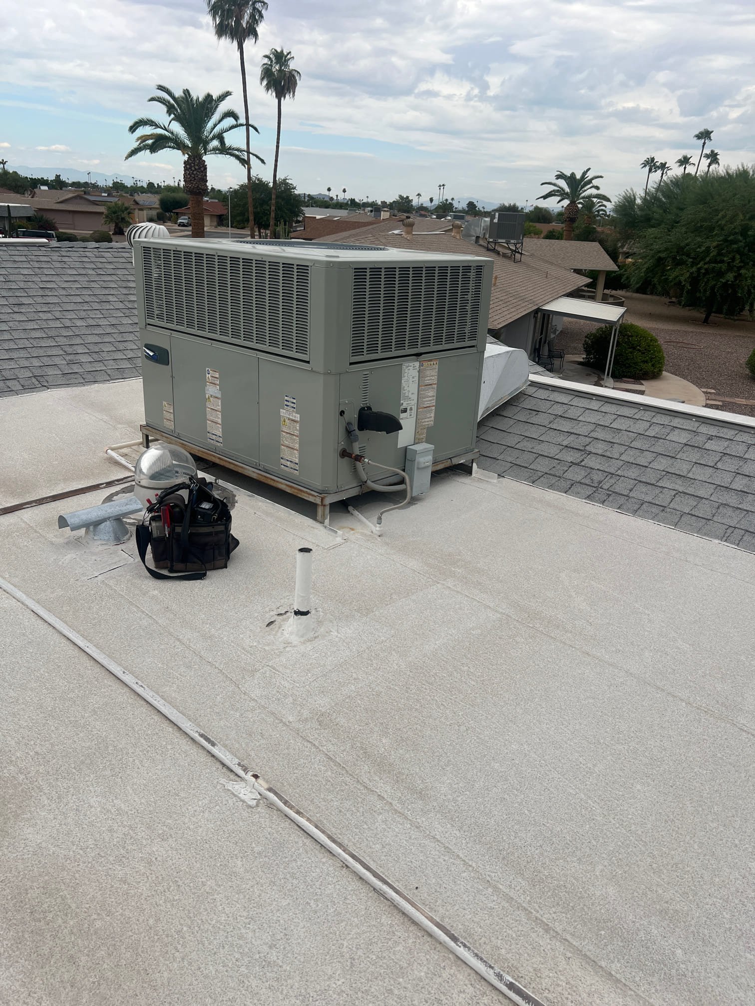 The breaker was tripped for the unit. I checked over the system and did not find any shorts and the capacitors tested good. I started the system and found it was suffering from excessively high starting amperage. I installed an inrush kit to Control starting amperage and prolong the life of the system. The units operating properly at this time.