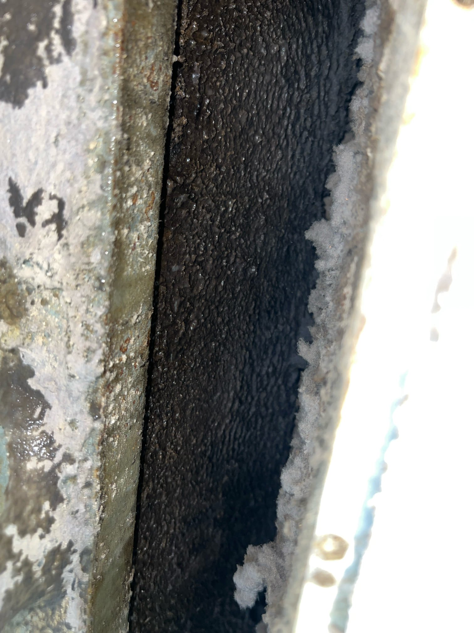 The unit has a dirty indoor coil from not using a filter. This was not something that could be visible on the previous visit due to the unit being a straight cool and had 2 inches of ice on the coil.
I cleaned the indoor coil. I scrubbed it with a brush and used a foaming no rinse spray that will continue to clean the coil until it’s been rinsed by condensation. It looked like the condensate drain was clogged so I cleared the condensate drain with a shop vac. The unit unit is producing a good temperature split