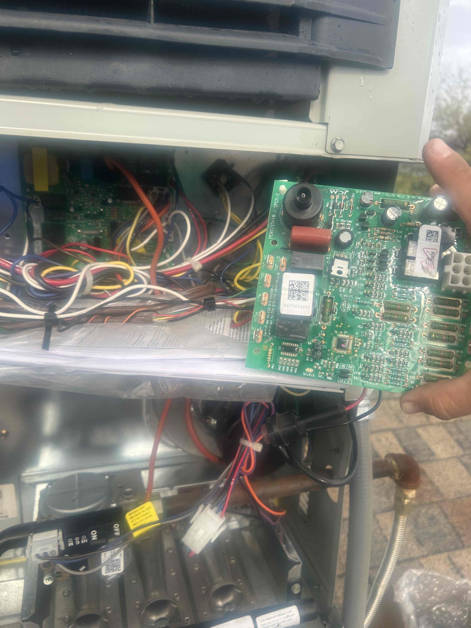 Replaced ignition board, and added foam padding along the fan shroud guard. Guard was causing a rattle.