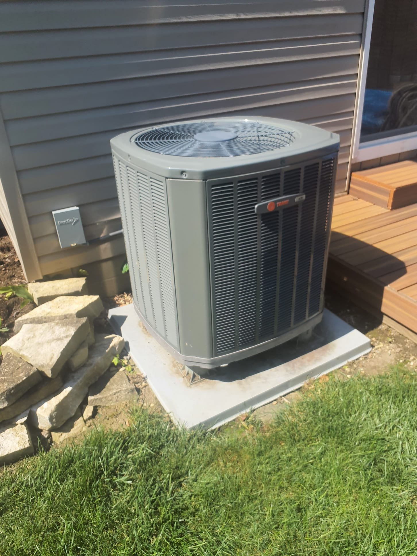 Performed cooling maintenance on a 2018 Trane heat pump system 
20x20x5 filter appears to be brand new
Humidifier is shut down properly for cooling season
Blower is clean
Indoor coil is clean
Put Condensate drain treatment tablets in the coil drain pan to prevent drain clogging
Compressor amp draw 6.0A
Outdoor fan motor 0.9A
Capacitor 34.5/5.0 microfarads 
Washed outdoor coil
Refrigerant charge is correct
Wiring is in good shape, all connections tight and free of damage
System is clean and operating within factory specifications at this time

Signed up for silver maintenance