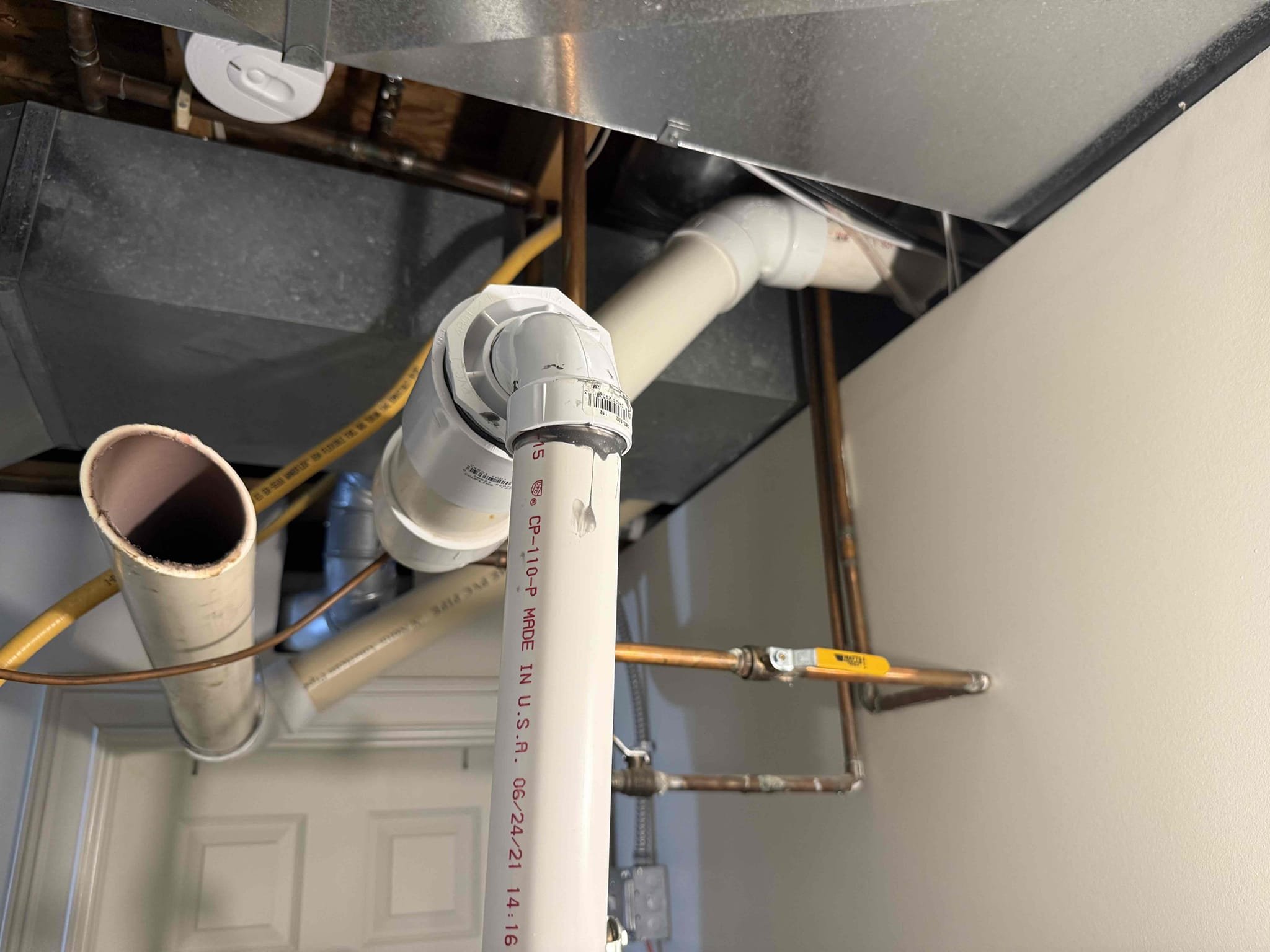 Perform heating PMI 
Check filter - 20x25x4 new 9/25 
Clean flame sensor
Water flush drain trap
Ohm test igniter: 68.3
Burners clean stainless steel installed last year
Inspect wiring for loose connections and/or hot spots - none found
Check humidifier pad: new today
Inspect exhaust flu - no concerns 
Set thermostat for heat
Check amp draw on blower motor: 5.3
Check amp draw on inducer motor:0.9
Check delta T -  64°
Furnace is in optimal running conditions

Customer concerns with water from drain. Seems to be either backing up from the floor or leaking from the drain line. Will have to quote drain repairs and return. Photos submitted to file 