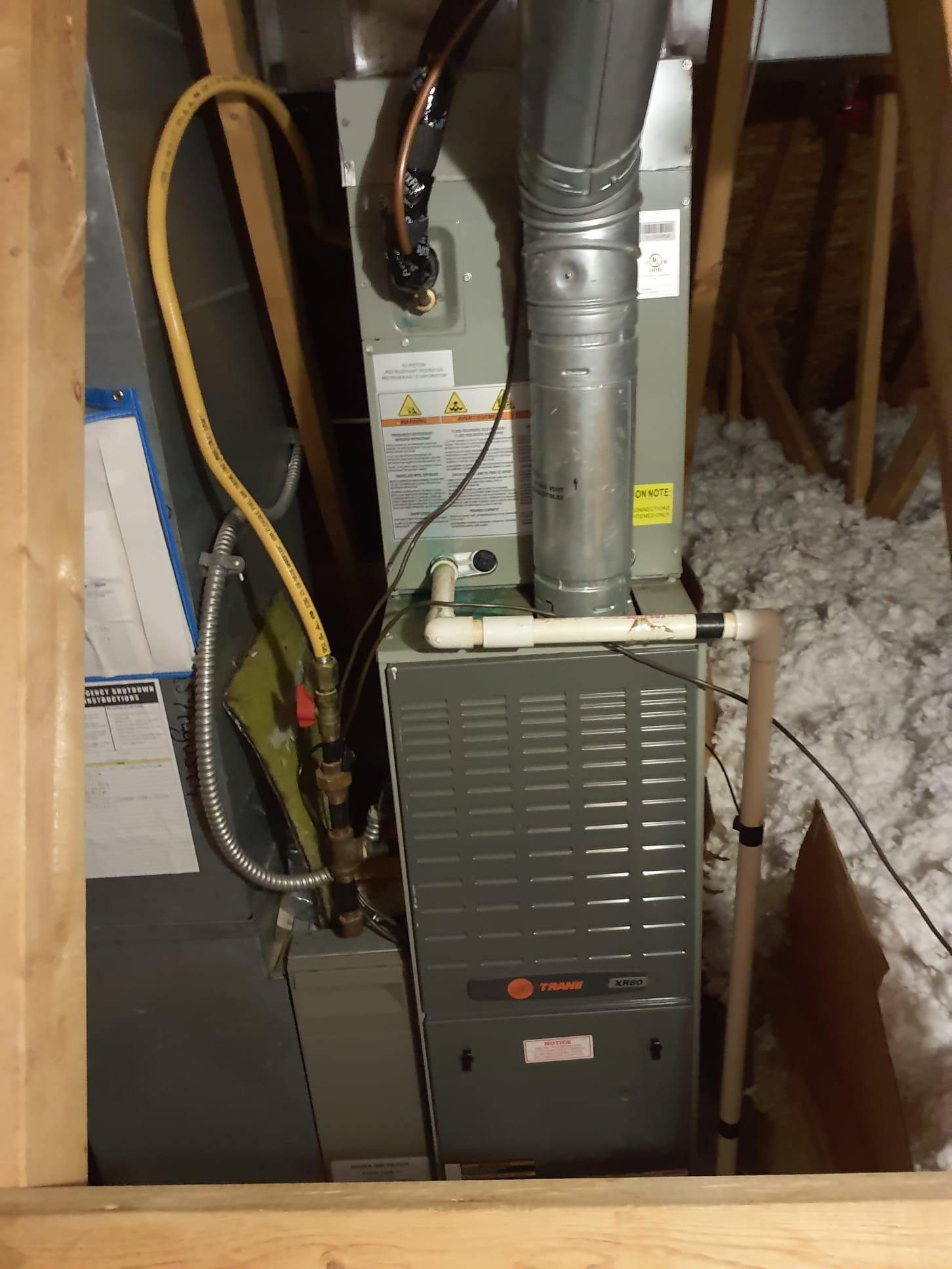 Performed two system heating maintenance 

Attic furnace:
2003 Trane single stage 80% efficient furnace 
Replaced 20x25x4 filter
Pulled and cleaned flame sensor 
Cleared pressure switch port
Blower wheel and motor in OK condition 
Blower capacitor in spec 
Gas pressure 3.5"wc
Temperature rise within specification range 
No signs of condensate drain issues related to air conditioning season
No concerns found with this furnace

Basement furnace 
2003 Trane single stage 80% efficient furnace
20x25x1 Filter is new
Pulled and cleaned flame sensor
Cleared pressure switch port
Blower wheel is a little dirty, but not to the point of causing an issue with operation
Blower capacitor is in spec
Gas pressure 3.5"wc
Temperature rise within specification range
No signs of water leaks from cooling season
No concerns found with this Furnace

Both furnaces are operating within factory specifications at this time 