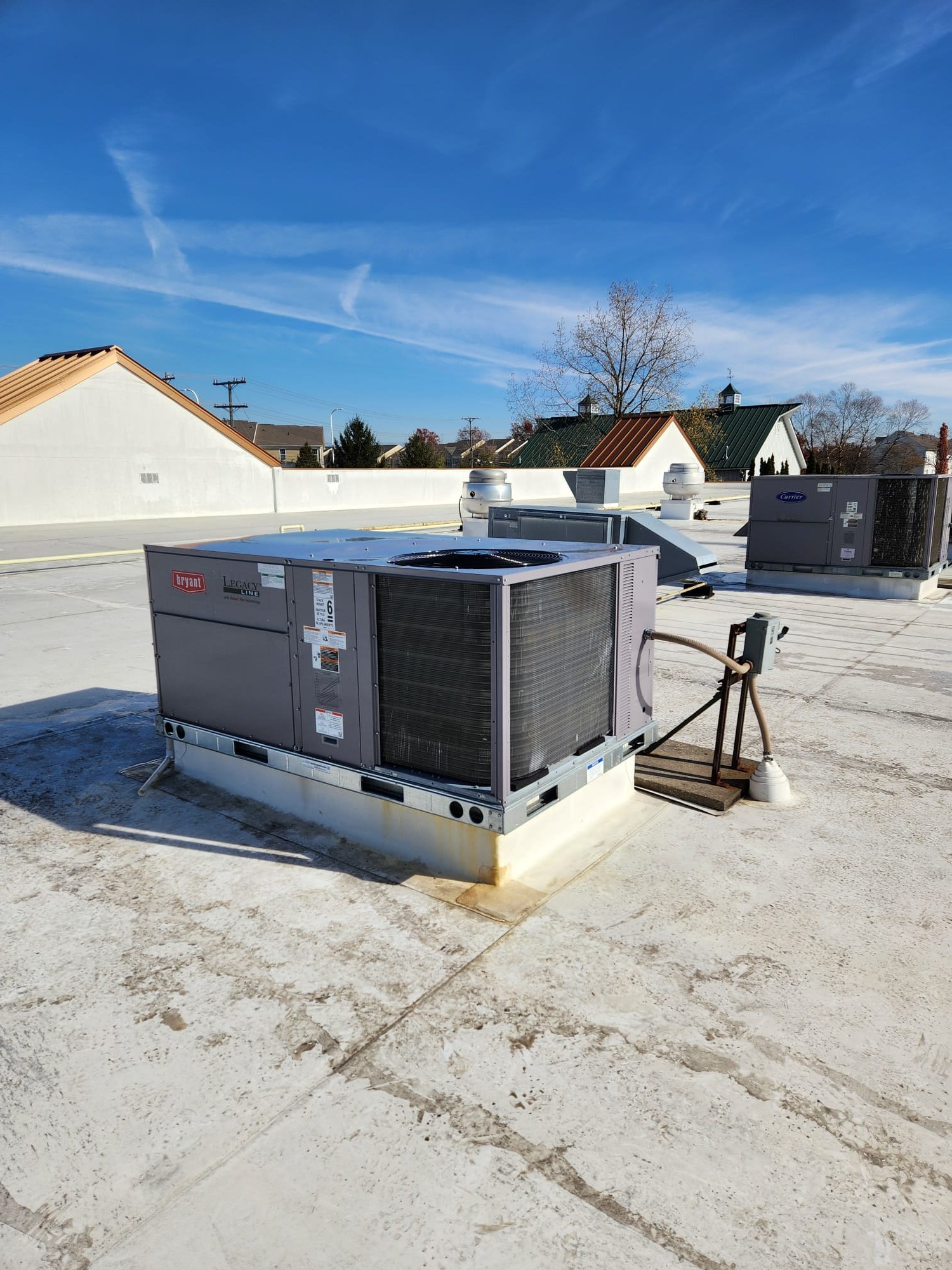 
Remove (2) existing RTU units

Equipment:
*Install 2 new Bryant 582LP05A150A3A0AA
Serial# 3625C10504
Serial# 3725C09090
*4 ton, 208/230 3Ph, 150K BTU, 
*Manual fresh air damper

Installation:
*Reconnect to existing high voltage electric and gas line
*Curb transition as needed
*Crane rental
*HVAC permit

Warranty:
*Manufacturers parts warranty 
*1 year Westin Air labor warranty