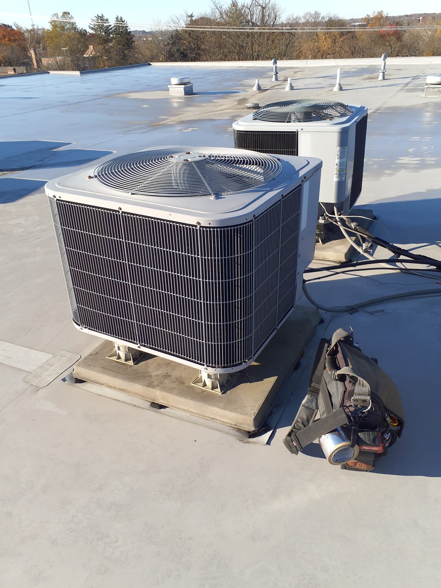 Heating maintenance on a 2009 Carrier heat pump system 
Replaced 16x25x1 filter
Removed door panels
Inspected indoor coil for dirt and signs of refrigerant leaks - No concerns
Blower capacitor measuring within spec 
Auxiliary heat strips each pulling 18A
No signs of wiring overheating for thr auxiliary heaters
Temperature rise with auxiliary heat and heat pump running together 45⁰
Temperature rise for heat pump solo 22⁰
Vapor line temperature 145⁰
Opened fresh air damper
Got on the roof
Visual inspection of outdoor coil - no concerns 
No ice buildup 
Tested defrost function
Inspected wiring - no concerns
System is operating within manufacturer's specifications at this time 