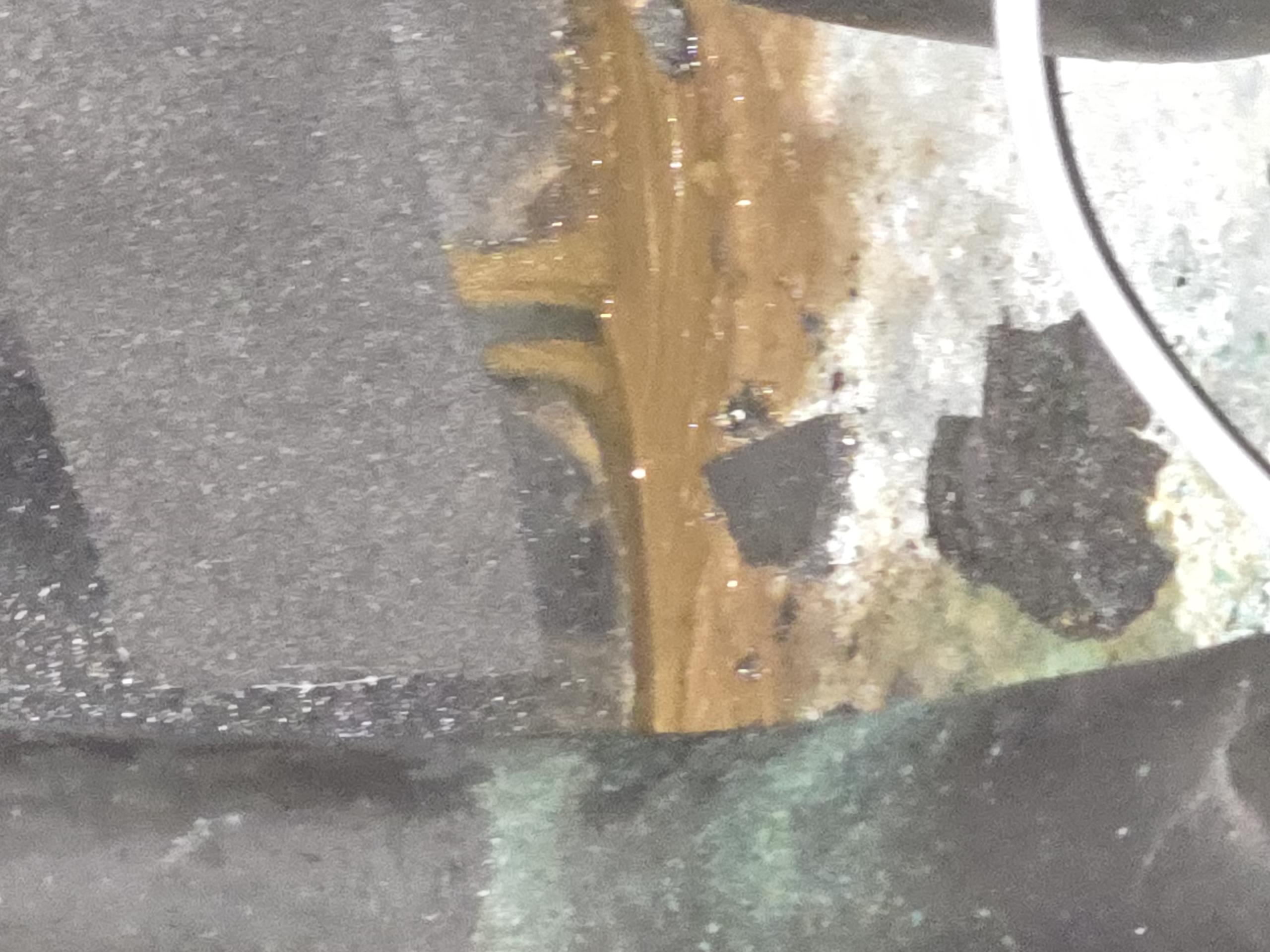 Upon arrival, system is in emergency heat mode for heating. There is an audible refrigerant leak when the door is taken off. Located refrigerant leak on a bend in the pipe just after the filter drier. The leak is a micro crack in the copper joint. Inspected area of leak and fund a sufficient amount of black residue matching the consistency and smell of acidic refrigerant oil commonly seen with a burned out compressor. With the recent compressor replacement, is is suspected that the refrigerant had been contaminated and the acidic oil has been eating away at the copper. 

Other issues found with the system include bypassed safety switches, burned wires, and an incorrectly plumbed hot water generator. There is also some kind of water in the bottom along the coaxial heat exchanger that could be evidence of a leaking coaxial heat exchanger but could not verify as the ground loop solution is unable to be distinguished between glycol or alcohol solutions.

Due to current and past refrigerant