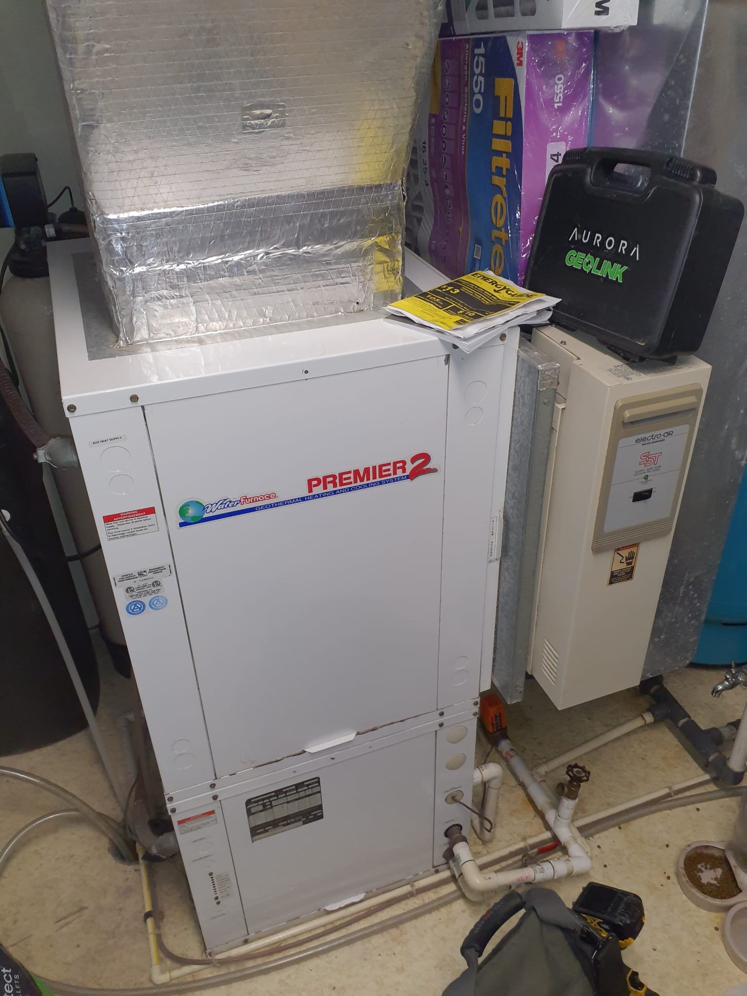 Upon arrival, system is operating in heating with no Water flow errors showing. Tested refrigerant pressures and temperatures, tester air temperature rise, and tested water temperature drop. Unable to test water pressure do to no pressure ports or guages. Well pump guage is reading 60psi during operation and 65psi during idl3 time. Refrigerant pressures are within spec per operation manual based on ~50F incoming water temperature. Temperature rise of 27F is within specs. Water temperature drop is on the low side of ~4F. This could be two things being that there is an abundance of water flow, or that the transfer of heat is not as efficient as it should be. In the case of heat transfer efficiency loss, due to the system being an open loop we'll system and the geo unit getting its source water before the water softener, it is possible that there is scale buildup on the inside of the pipes leading to decreased water flow, and the scale buildup acting as an insulator and keeping the water 