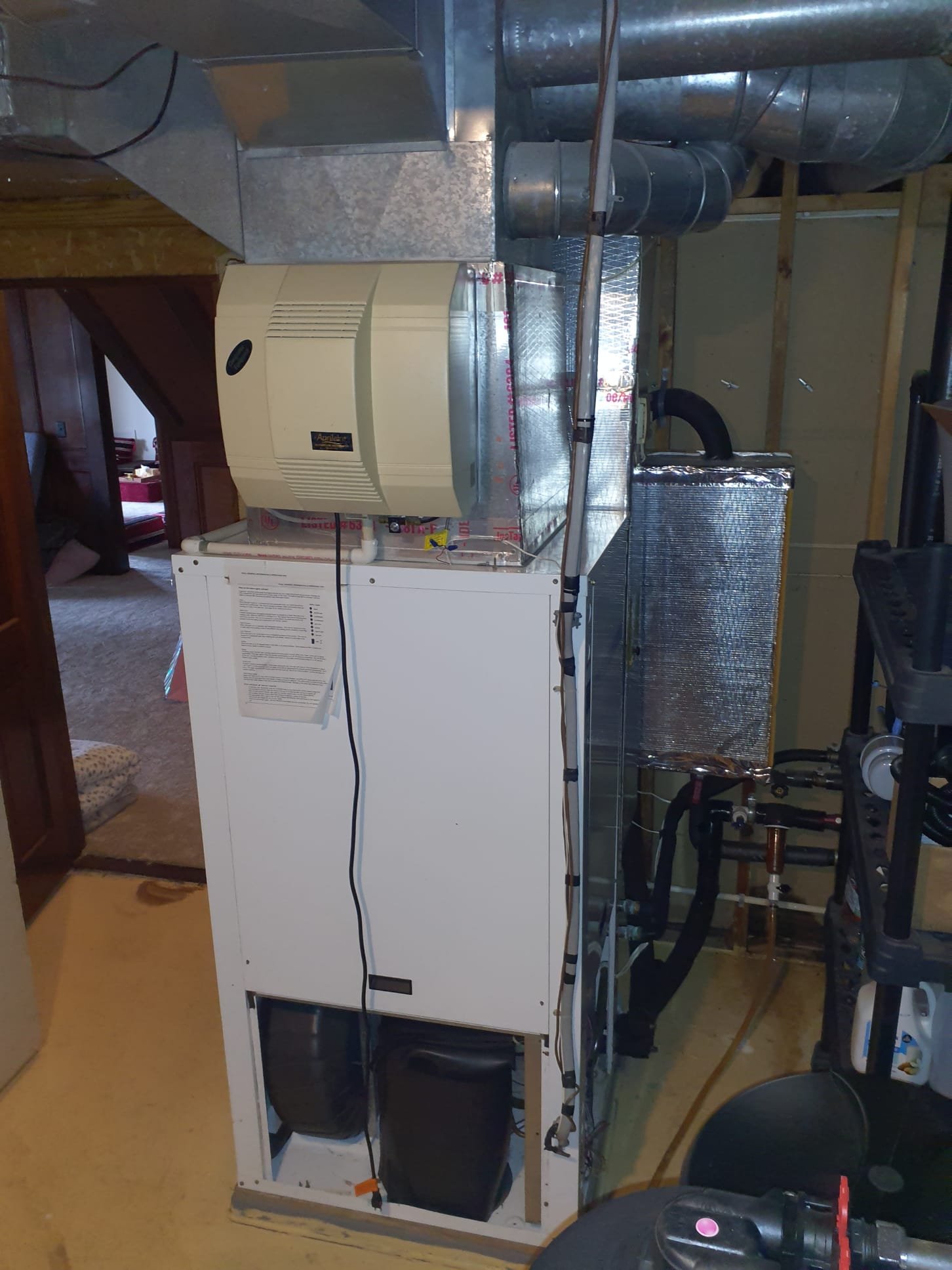 Upon arrival, system is showing a "low pressure " light. Reset system and attempted to fireoff while checking R-22 refrigerant pressures. Stagnant pressure is 110psi. System comes on but only runs for approximately 5 seconds. During operstion, suction pressure falls to 85psi and discharge rises to 1130psi. Low pressure switch is rated at 20psi. Checking through wiring diagram shows that a low pressure code can also occur when there is a heavy load from the compressor. Attempted to start up again while bypassing low pressure switch and reading amp draw on compressor. System comes on and initial start up amp draw was approximately 70A, and only dropping to 65A after five seconds before shutting off on low pressure code. Compressor has worn out, is causing high amp draw and will not operate anymore. Due to the age of the unit, manufactured in 1994, full system replacement is highly recommended. 