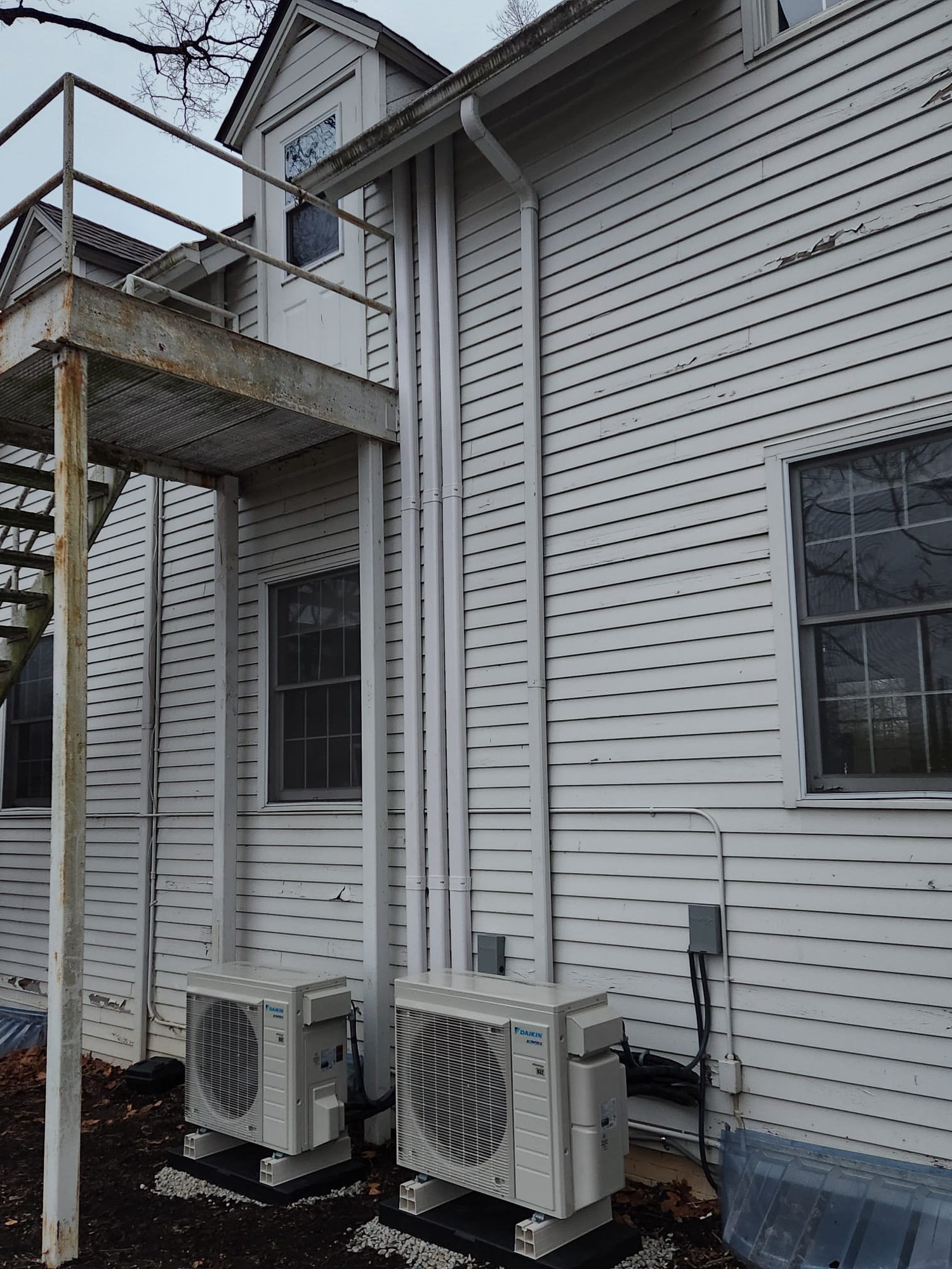 
Install new Daikin ductless systems.
Equipment:
*Large Room - Daikin Aurora R-32 2 ton single head system
  -Indoor Model# RTX24AVJU9 Serial: Y015094
  -Outdoor Model# FTXV24AVJU9 Serial: Y014167
*Two Offices - Daikin Aurora R-32 1.5 ton two headed system
  -Indoor Model#1 FTXV09AVJU9 Serial: Y288620
  -Indoor Model #2 FTXV12AVJU9 Serial: Y158032 
  -Outdoor Mode l # 2MXTH18AVJU9 Serial: Y003913

Installation includes:
*(3) Wireless remote control
*All Refrigerant line sets
*(3) Condensate pumps and drain to exterior
*High voltage and control voltage from outdoor unit to indoor unit
*High voltage circuits to outdoor units

Warranty:
12 Year Daikin manufacturers parts warranty
2 Year Westin Air labor warranty