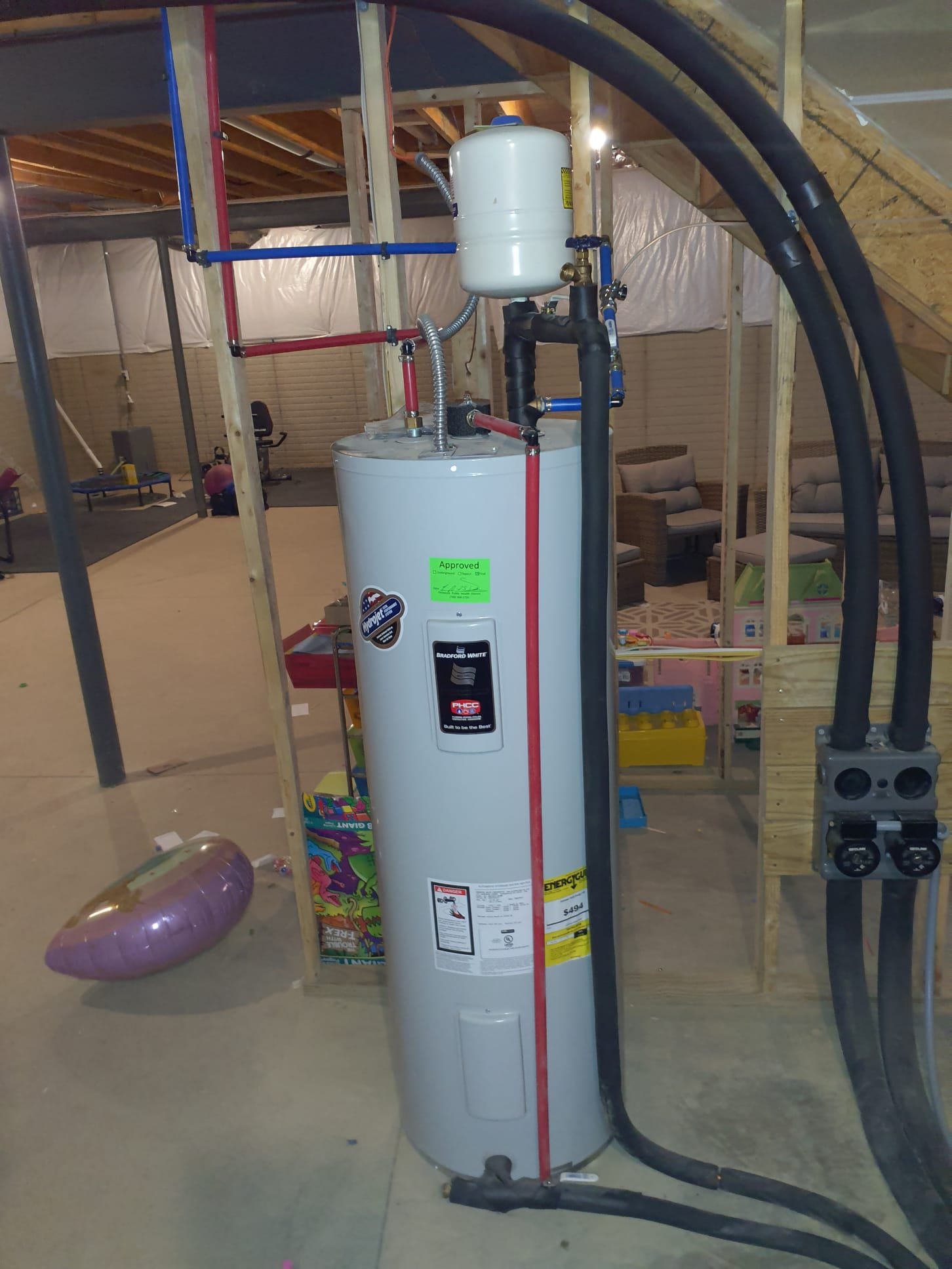 Upon arrival, system is locked out on E71-Loss of Charge code. Used aid tool to check refrigerant pressures. System is stagnant with 180psi refrigerant system. Performed power reset to clear lockout. Performed operational test in both heating and cooling modes and cross referenced to installers manual to know whether pressure, and temperatures are within spec. Performed heating test first. After 15 minutes of run time, refrigerant pressures and temperatures are within specifications. Ground loop temperature drop is within spec. Air temperature rise is within spec. No issues with the operation of the unit were found. 
Found that hot water generator lines are swapped based on Waterfurnace installation manual. 
Disconnect and reconnect hot water generator lines to correct DHW IN and DHW OUT connections. 
