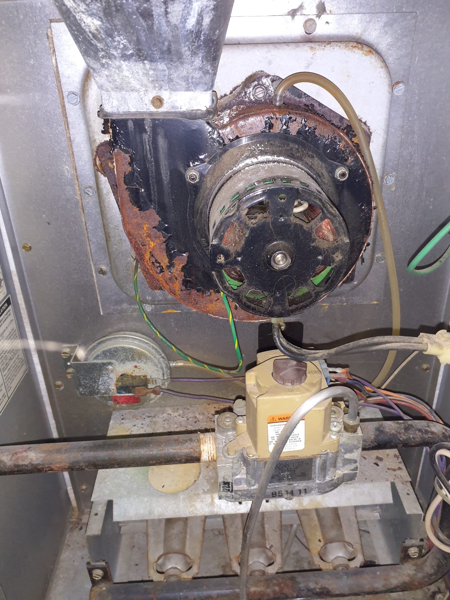 1995 Armstrong Air furnace is in poor condition. Cause of no heat is a failed exhaust motor. 
Replace failed OEM inducer motor with new OEM inducer motor. Test run operation. System is operational at this time. 