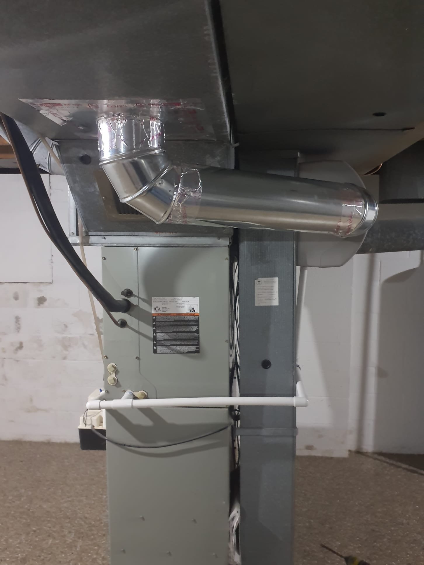 Install humidifier on hvac system. 

Install humidifier on return duct with bypass piped to supply. Water line installed with new water valve on hot water line. Drain ran to drain pump. Wired into duct mounted controller with 24v xfmr powered from EAC terminal. If humidiy has a hard time keeping up with heat only, turn thermostat fan option to ON. test run all humidifier components and drain pump.