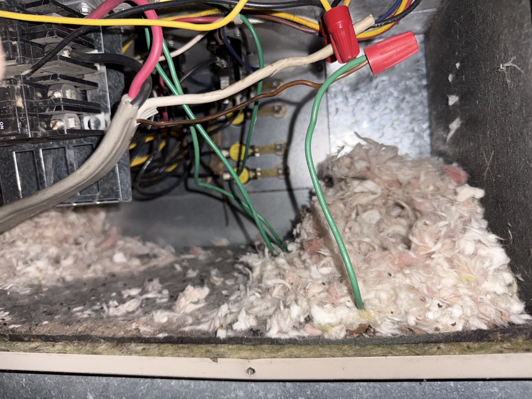 Unit tucked away in a very tight closet. Had to dig lots of things out of closet in order to access unit, air mattress, comforter, paper towel rolls, pillows, and toilet paper rolls Inspected unit and found mouse nest inside of heating element compartment. Mouse was hanging from element hookups and short circuiting unit. Remove mouse and test run system. Vacuum nest debris to deter future nesting. Comforter in closet seemed to be a source for nest I would recommend trashing it and sealing any openings on room allowing  mice in. 