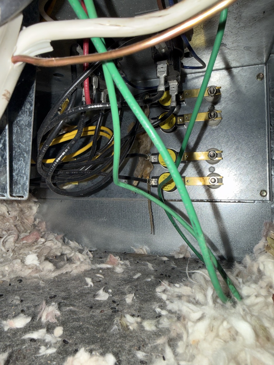 Unit tucked away in a very tight closet. Had to dig lots of things out of closet in order to access unit, air mattress, comforter, paper towel rolls, pillows, and toilet paper rolls Inspected unit and found mouse nest inside of heating element compartment. Mouse was hanging from element hookups and short circuiting unit. Remove mouse and test run system. Vacuum nest debris to deter future nesting. Comforter in closet seemed to be a source for nest I would recommend trashing it and sealing any openings on room allowing  mice in. 