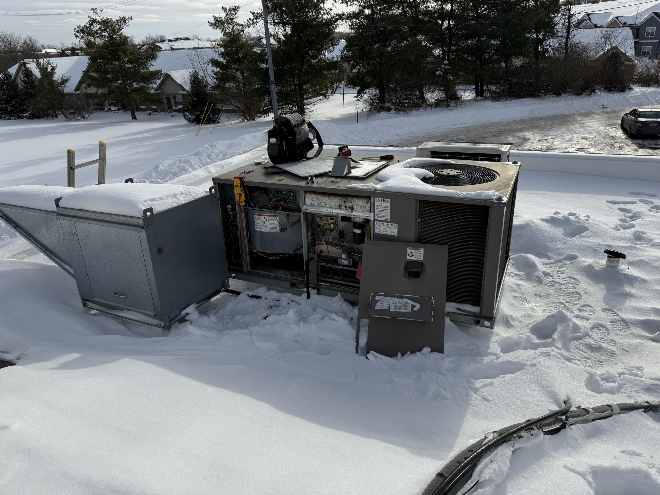 Resettable fuse failed
Jumped past it to test operation
Combustion fan (inducer motor) failed 
Inspected heat exchanger, giant hole in it
Due to condition of the system, we recommend unit replacement 