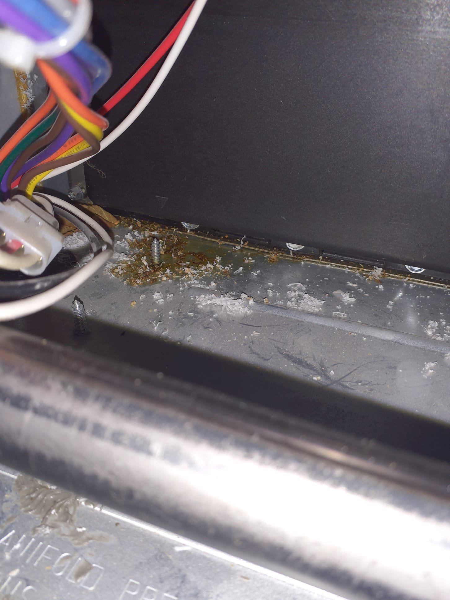 Sysbstance seen during inspection is suspected to be an adhesive or sealant used during manufacturing of the furnace at the factory. Substance is hard to the touch with no tacky feeling. Removed inducer motor to clean and inspect furnace for any signs of leaks or what this substance would come from. None found. Bill to 3-pillar