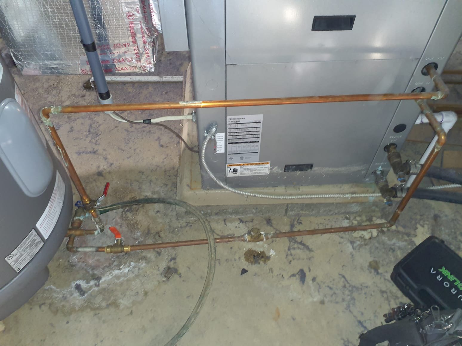 Performed an operation test on the Waterfurnace Legend unit to check for any out of specification measurements. Performed a heat of extraction worksheet to measure heating BTU output and efficiency. Heat of extraction shows that the system is outputting 31,525BTU/Hr. Waterfurnace specifications list the BTU/Hr output at 30F ground water temperature to be between 27,000 and 35,000 BTU/Hr. Compressor is running at 15A and is within specifications. Blower motor is running at 3A and is within specifications. Performed an operation test on emergency/auxiliary heating strips. Both heating strips are running at the proper 20A. Shut down heat stips to verify that the heat stips are not stuck on or shorted out. 0A reading when off. During operation test of geothermal, the only abnormal reading was the ground loop pressure. Ground loop pressure is currently at 20psi dormant. Ground loop pressure should be within 60-80PSI per Waterfurnace manufacturers recommended pressures. Low ground loop press