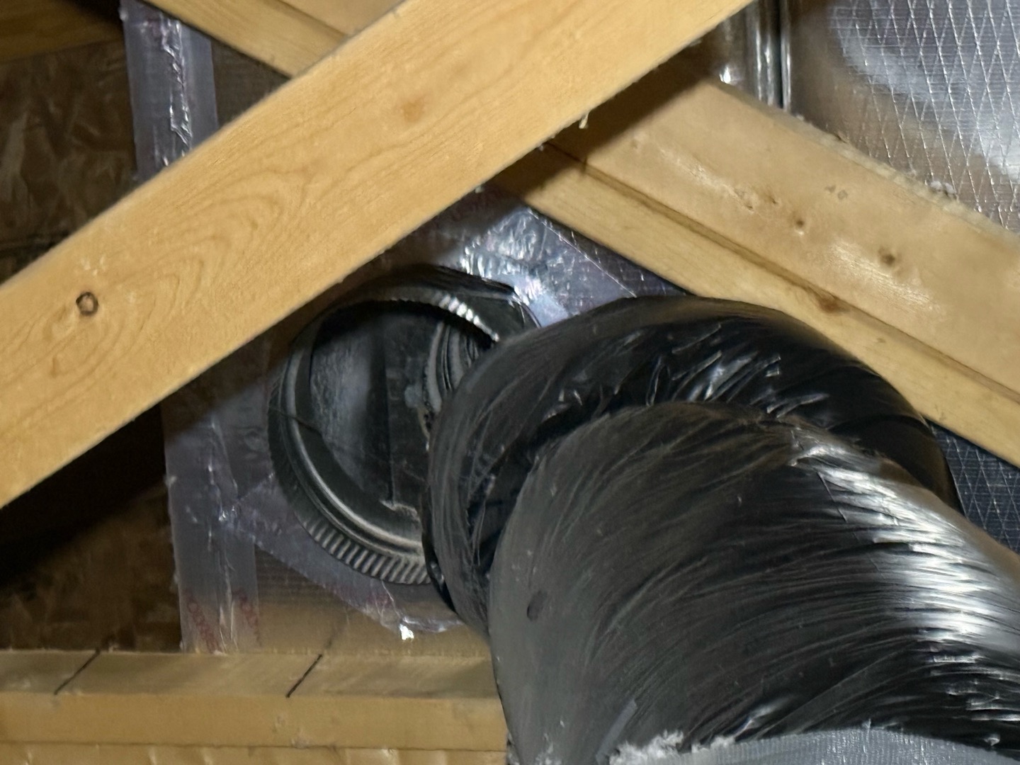 Upon arrival discussed concerns with homeowner and quickly interpreted the attic pipe may have problems due to bedroom is closest to furnace and airflow is significantly affected, after inspecting attic found pipe was disconnected in attic where it used to be attached had ripped off from the weight of the pipe. Restored connection and screwed strap onto pipe, then adjusted support so there’s not so much weight on the connection to cause separation. 