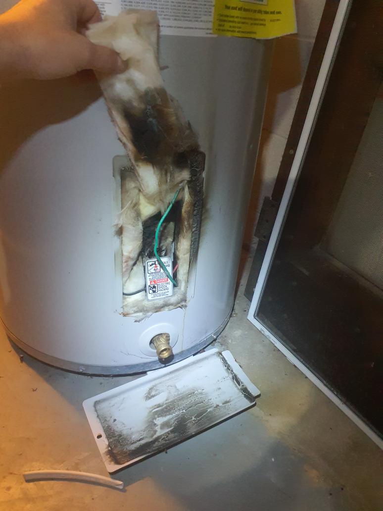 Definitely an electrical burnt smell around the furnace 
No odors inside the furnace or inside the geo split units
Noticed char marks on the water heater
Definitely the source of the burnt electrical smell
Water tank needs repaired/replaced
