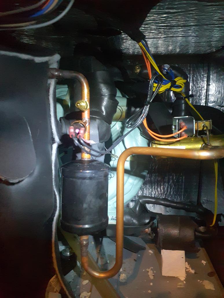 Service warranty 
Low voltage wires that were taped above the Compressor got overheated by the torch during compressor replacement 
System was locked out on FP1 sensor error
The yellow FP1 wires took the brunt of the damage and were shorted
Cut the burnt section out and spliced with wire nuts
Disconnected Y2 and opened supply register on the supply trunk

Service port caps were left off.  Put them back on. 