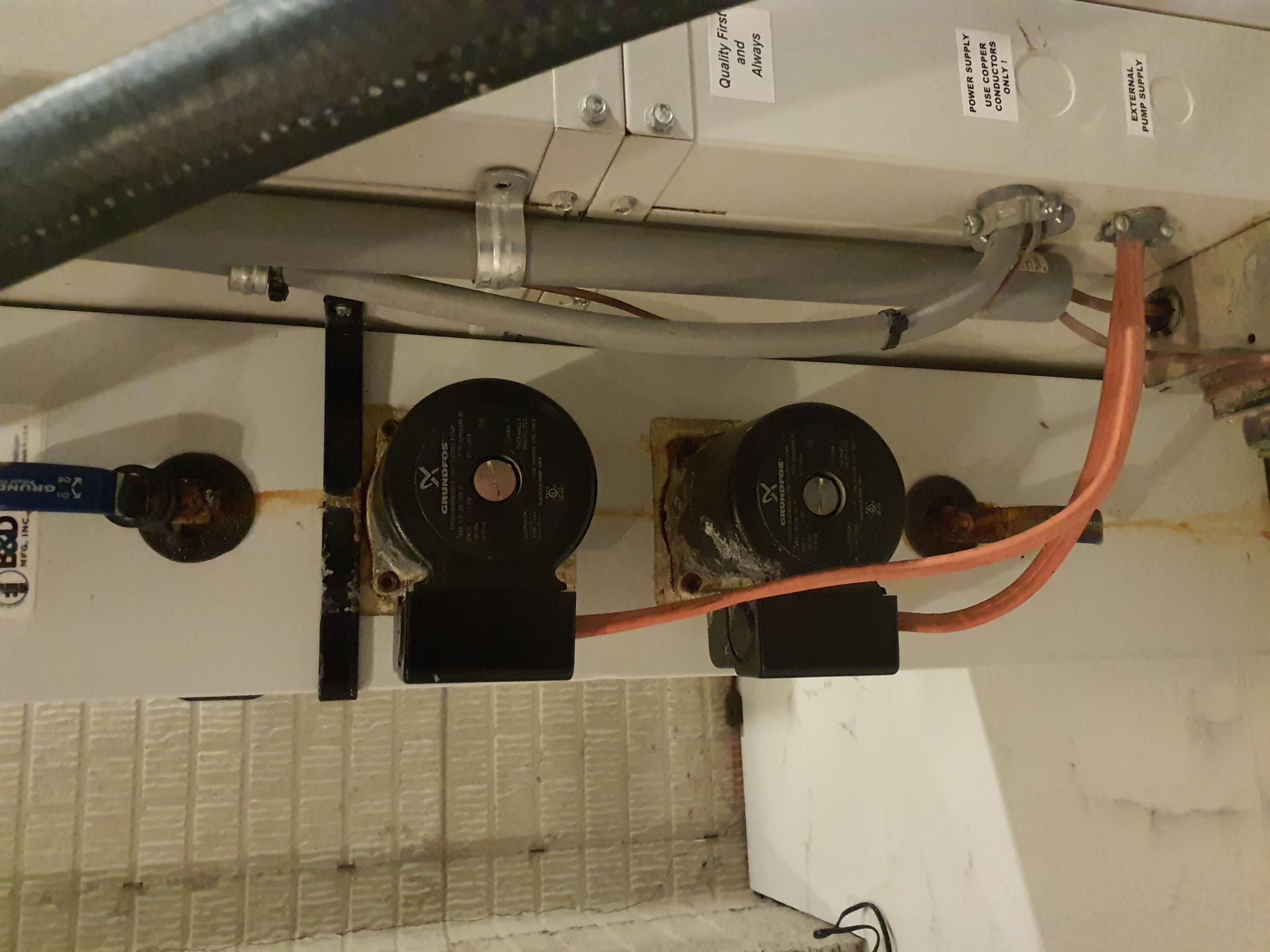 Service recall
Second floor system locked out on condensate overflow safety
Cleared the drain
Put pan tablets in both geo pans

First floor unit has a stored fault for high pressure
Ground loop has 2 pumps, one is failing 
What likely happens is with extended run time, the pump overheats and shuts down
With insufficient water flow,  the geo cannot reject the heat properly and trips high refrigerant pressure safety switch
We recommend replacing the entire flow center, it will come with two new pumps