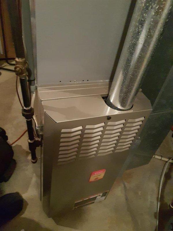 Performed scheduled heating maintenance on one gas-fired furnace, including a visual inspection of the cabinet, flue/vent piping, supply plenum and ductwork, and gas supply piping, valve, and fittings. Verified connections and components were intact with no significant rust, corrosion, or frost present, and noted dampness staining on the concrete floor near the furnace base for monitoring.