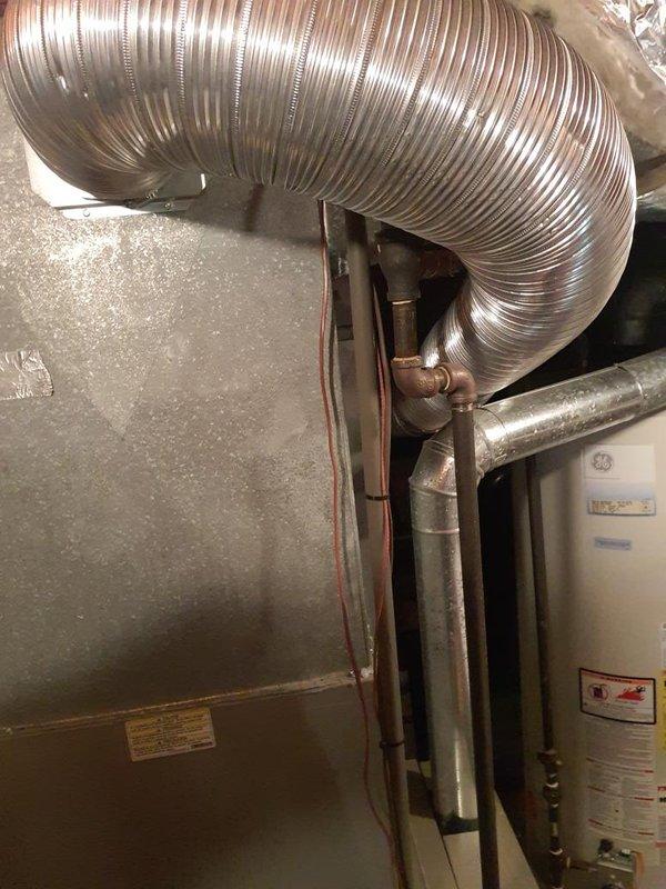 Performed scheduled heating maintenance on one gas-fired furnace, including a visual inspection of the cabinet, flue/vent piping, supply plenum and ductwork, and gas supply piping, valve, and fittings. Verified connections and components were intact with no significant rust, corrosion, or frost present, and noted dampness staining on the concrete floor near the furnace base for monitoring.