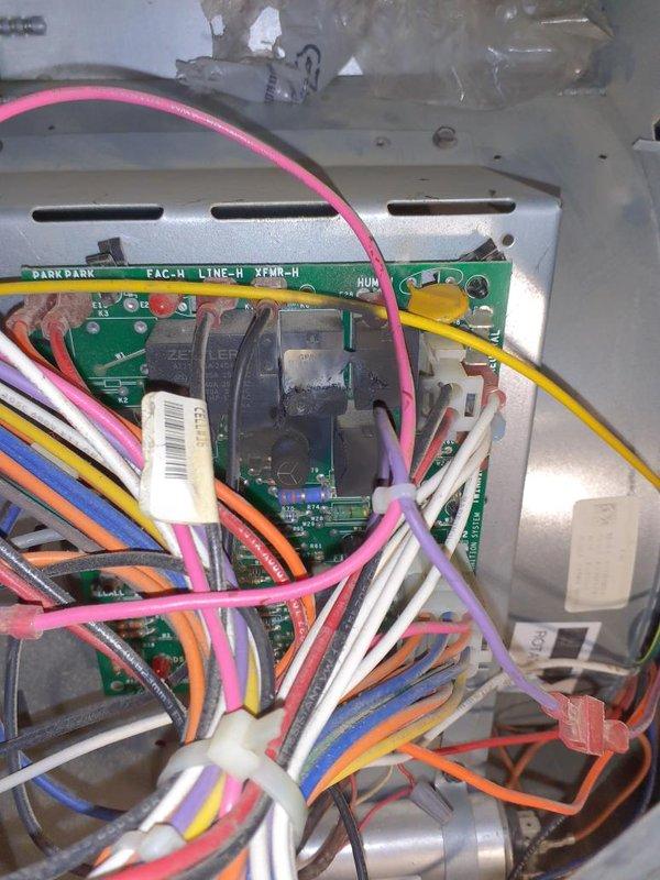 Performed diagnostic on furnace with no response on initial startup. Inspection of the integrated furnace control board revealed heat damage and scorching on the high-voltage line-side relay (Zettler) and adjacent components, with charred sealant and tape in the surrounding area, confirming a failed control board. Recommend replacement of the integrated furnace control board and inspection of associated wiring and terminal connections for heat damage prior to returning the unit to service.