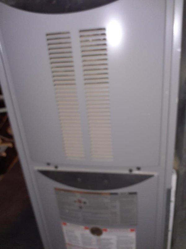 Performed preventive maintenance inspection on one upright gas furnace during a first-time visit; cabinet exterior was clean and intact with no signs of rust, frost, or damage. Inspected the blower assembly and noted heavy dust and grime buildup on the blower wheel blades and hub plate, along with surface rust on the motor shaft, and recommended cleaning and continued monitoring of shaft condition. Customer enrolled in the maintenance plan with 16x25x1 filter size on file and requested a quote for a whole-home humidifier installation.