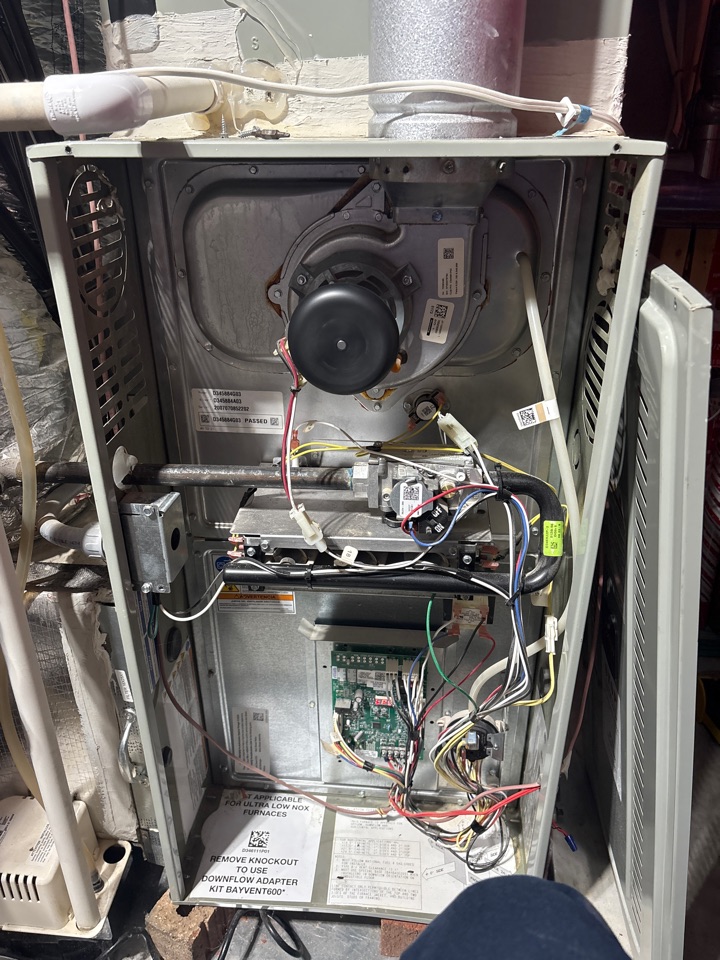 Working on furnace maintenance. 