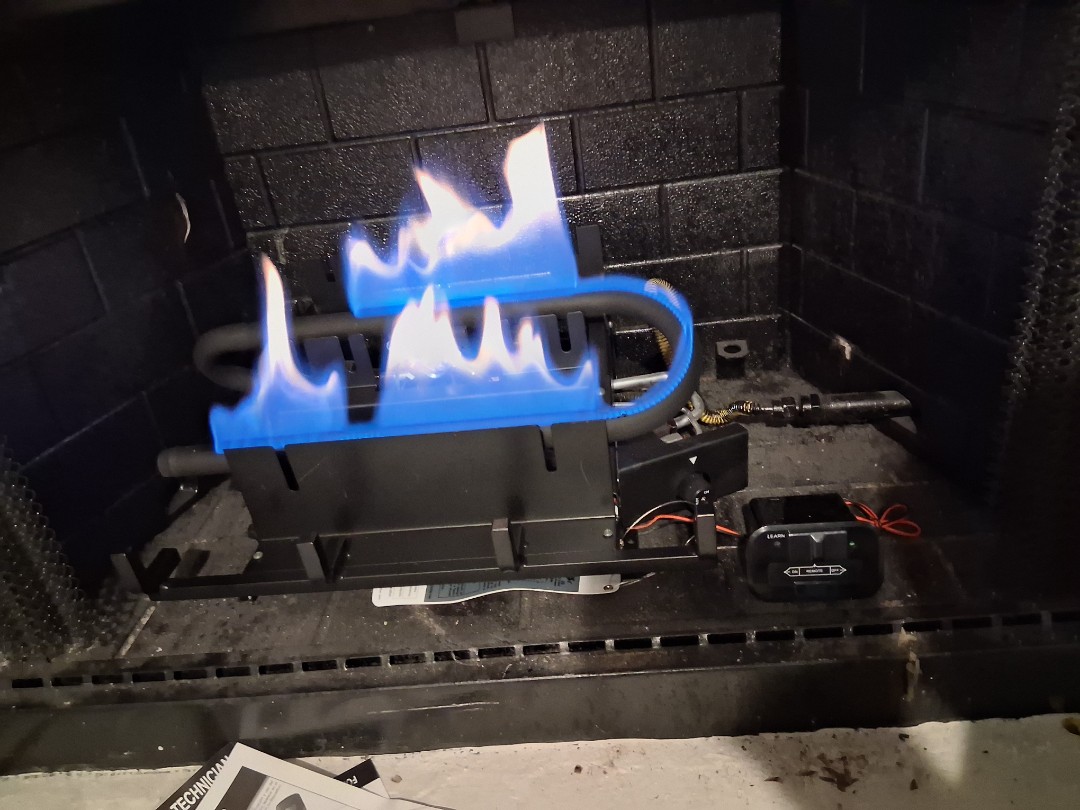 Installation of New Gas Logs for the fireplace. 