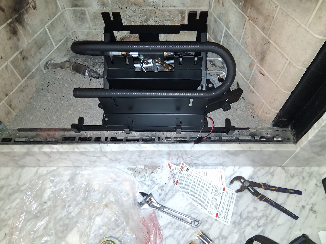 Replaced gas fireplace logs for home in Newman.