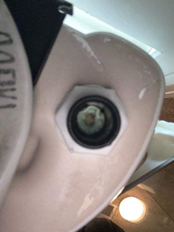 Installed and positioned security camera system with dome-style camera unit mounted to ceiling structure. Verified proper lens alignment and ensured secure mounting of device to perforated ceiling panel with appropriate hardware and bracket assembly.