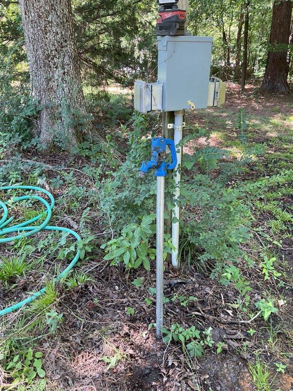 Plumber repair leaking waterline on yard hose bib