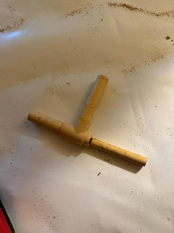 Performed plumbing inspection and maintenance in crawlspace area, accessing exposed piping systems between floor joists. Evaluated condition of copper supply lines and PVC drain pipes, checking for leaks, corrosion, and proper support. Cleaned and removed debris from work surfaces in the immediate area following completion of the inspection.
